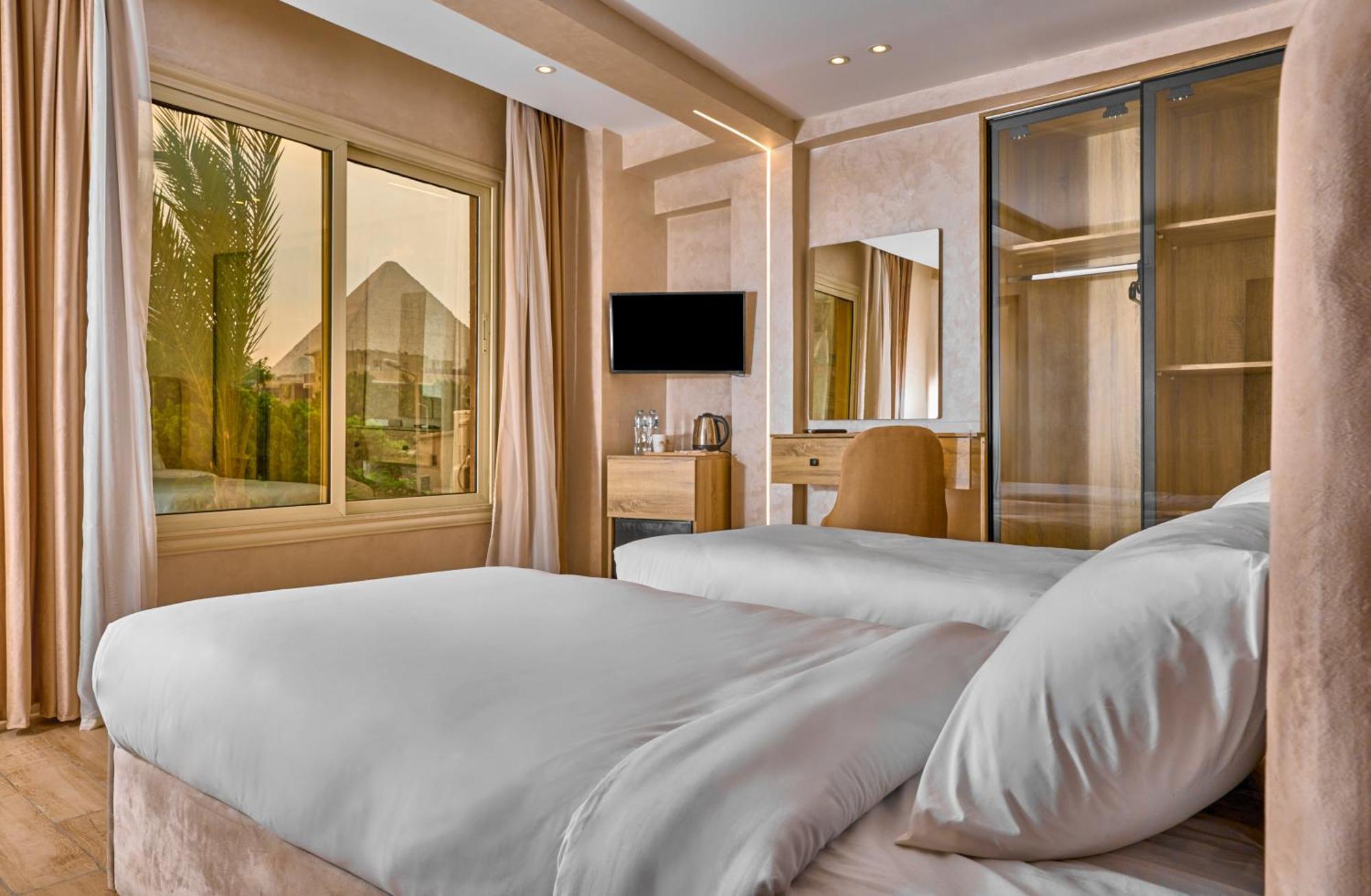 Cleopatra Tower Pyramid View Hotel Kafrat al Jabal ภายนอก รูปภาพ